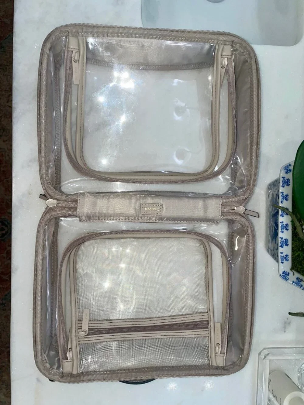 CALPAK Train Case and Large Cosmetic bag.